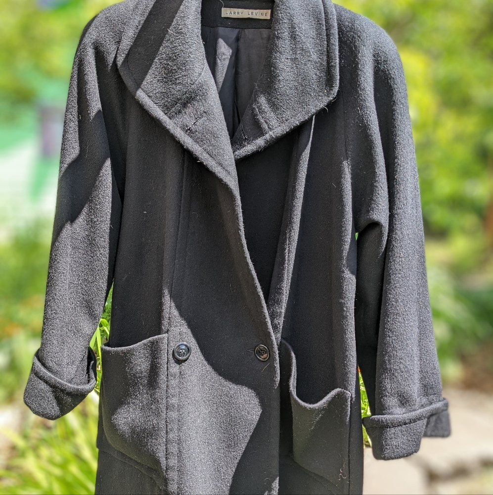 Used black wool swing over coat used